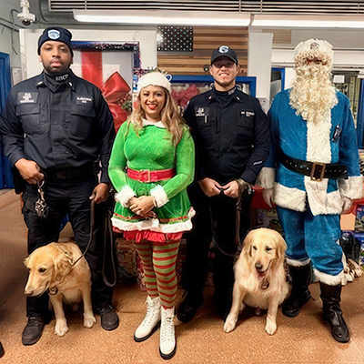 First Responders Lions, NYPD and K-9 Unit bring holiday cheer and teach kids about service dogs’ vital role.
