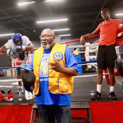First Responders Lions mentor youth at a Brooklyn boxing gym, promoting fitness, safety and career aspirations.