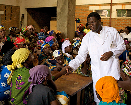 Portrait of Dr Denis Mukwege with women at Panzi Hospital in Bukavu, Democratic Republic of the Congo. Photo: Torleif Svensson