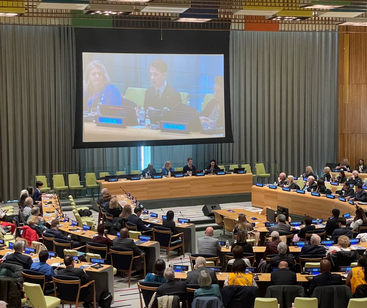Leo Konstantin Kölmel, shown on screen, speaks during a panel discussion at LDUN New York on March 3, 2023.