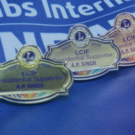 International President Singh LCIF support pins